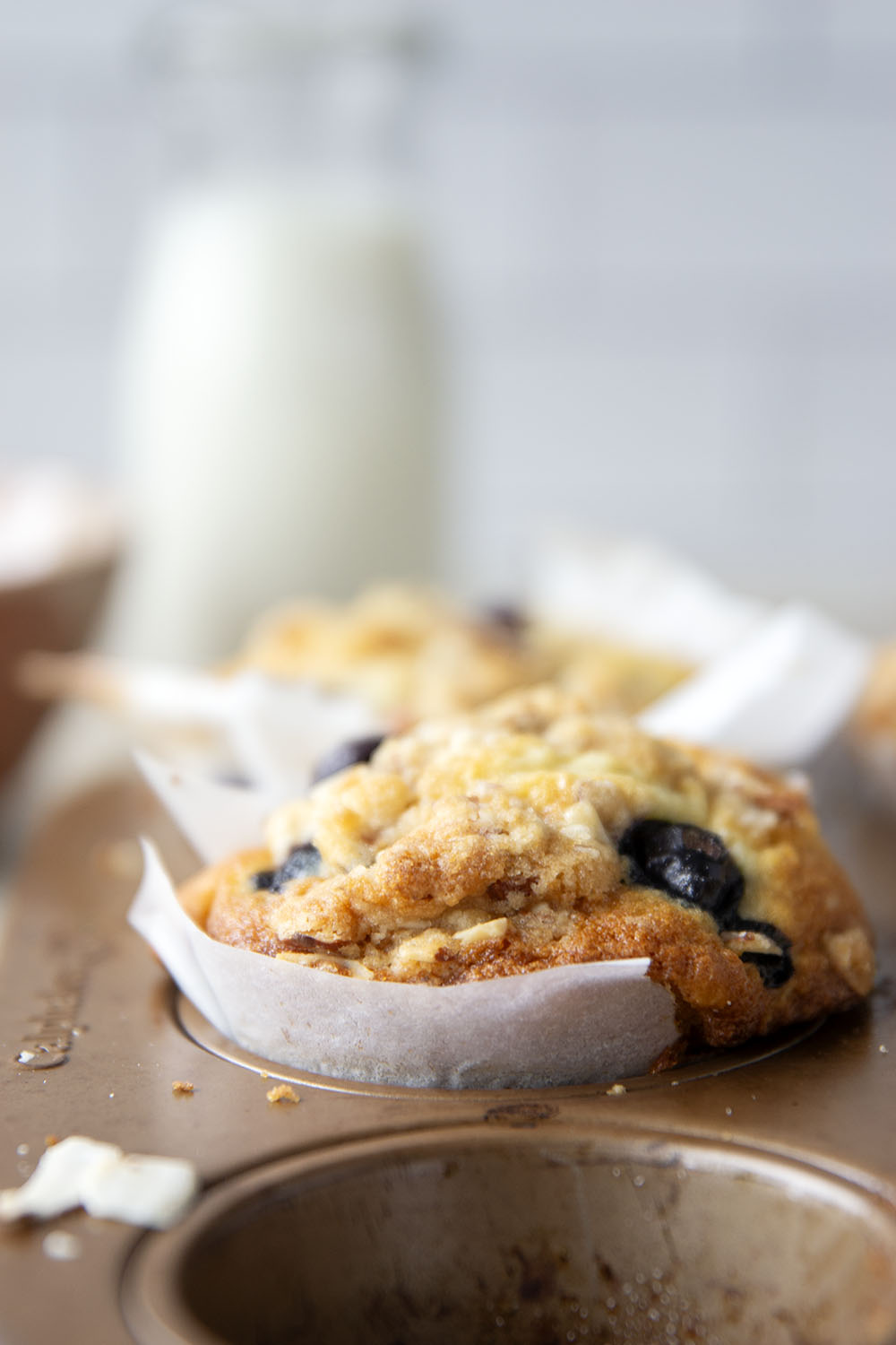 These big bakery-style blueberry almond streusel muffins will be the star of your brunch! Supremely moist inside, loaded with juicy blueberries and topped with a buttery almond topping.