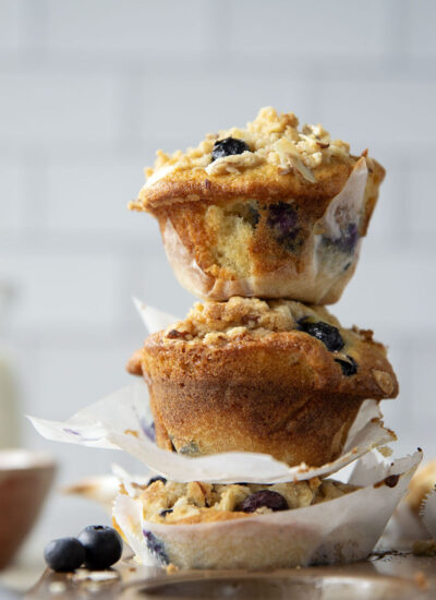 These big bakery-style blueberry almond streusel muffins will be the star of your brunch! Supremely moist inside, loaded with juicy blueberries and topped with a buttery almond topping.