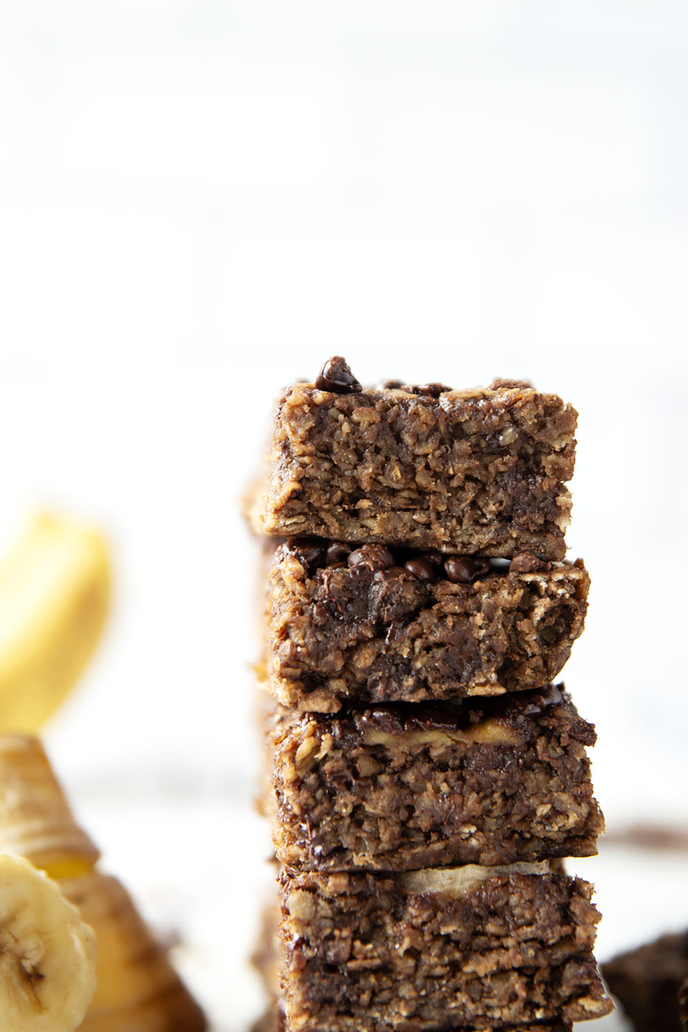These soft and chewy chocolate banana granola bars are packed with tons of banana flavor and a double dose of chocolate. Ideal for make-ahead breakfasts and they freeze great as well!
