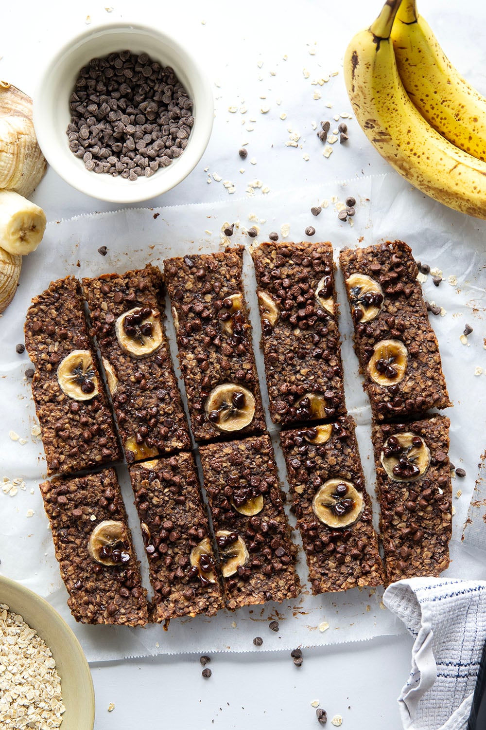These soft and chewy chocolate banana granola bars are packed with tons of banana flavor and a double dose of chocolate. Ideal for make-ahead breakfasts and they freeze great as well!