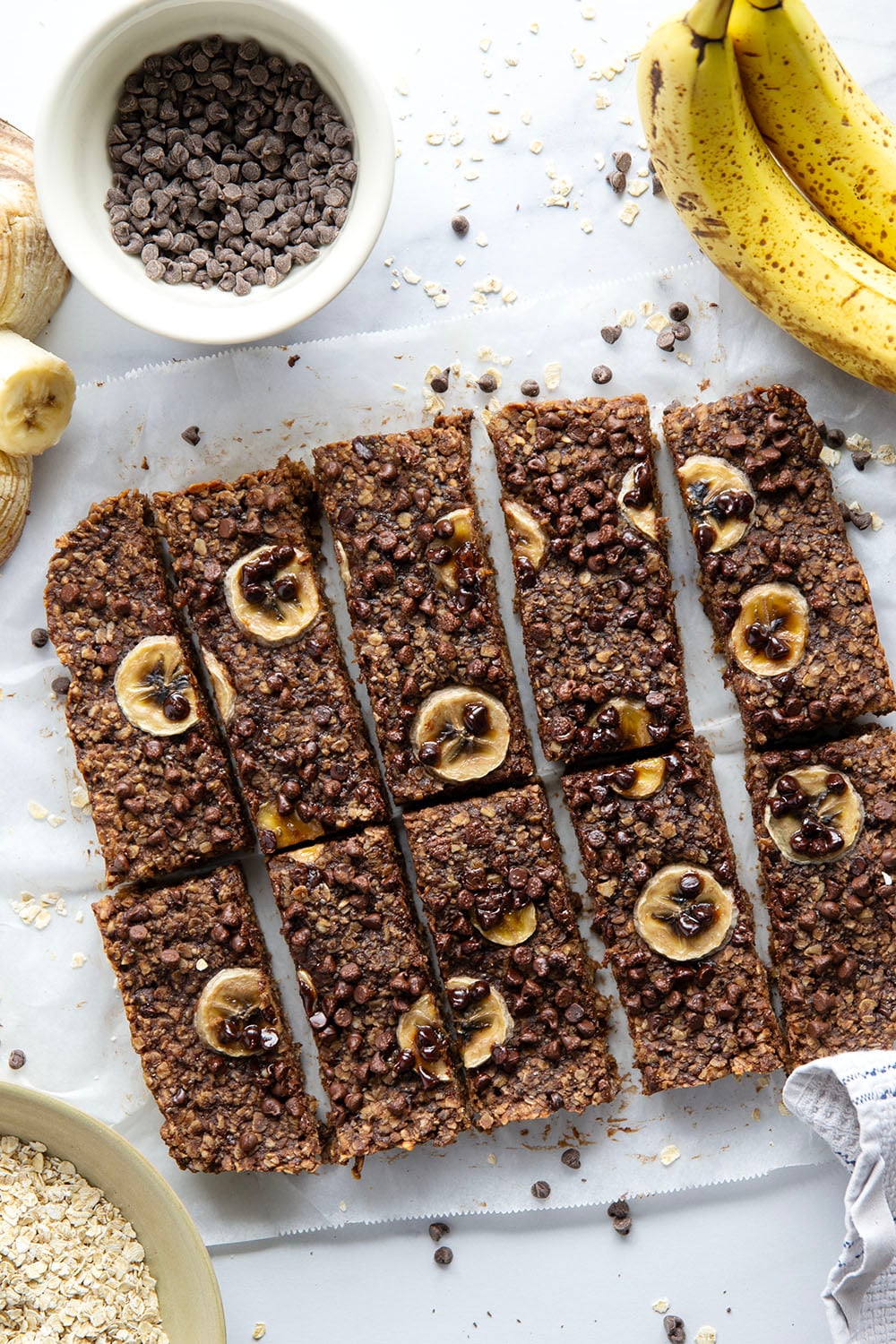 These soft and chewy chocolate banana granola bars are packed with tons of banana flavor and a double dose of chocolate. Ideal for make-ahead breakfasts and they freeze great as well!