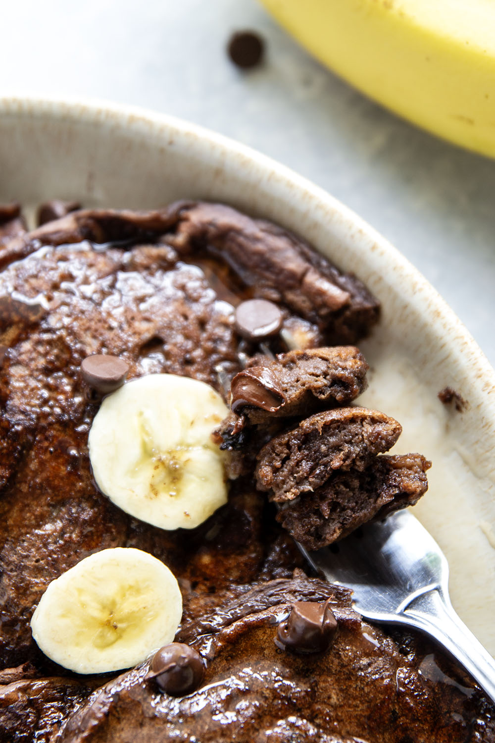 These thick and fluffy chocolate banana pancakes are the ultimate breakfast indulgence! Loaded with a double whammy of chocolate and lots of banana flavor.