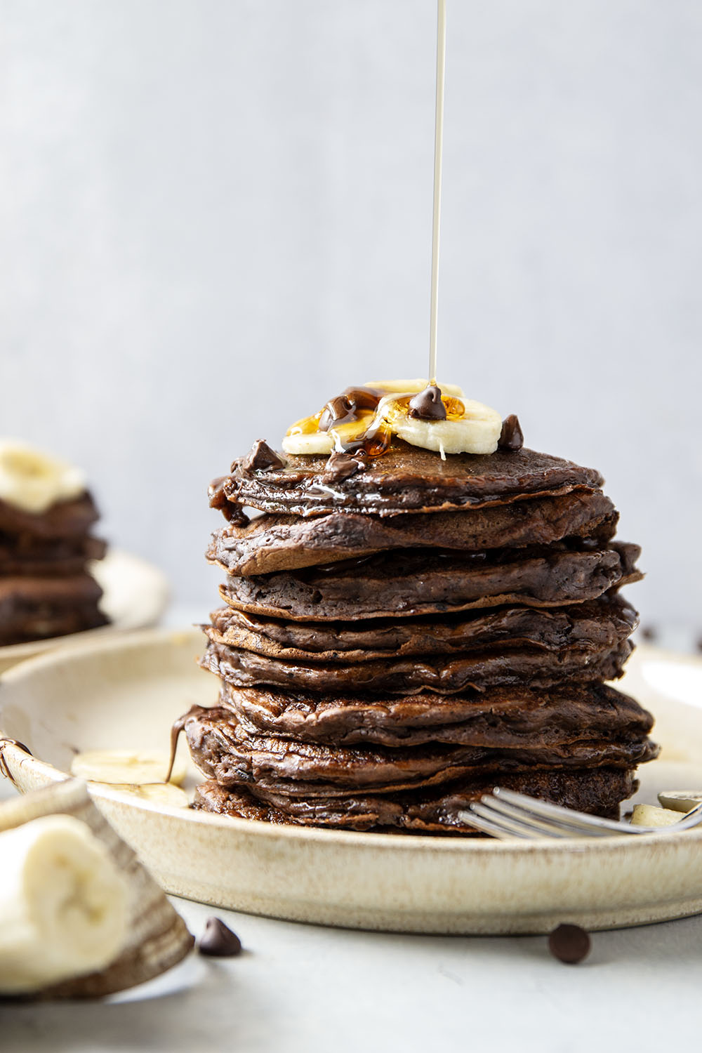 These thick and fluffy chocolate banana pancakes are the ultimate breakfast indulgence! Loaded with a double whammy of chocolate and lots of banana flavor.
