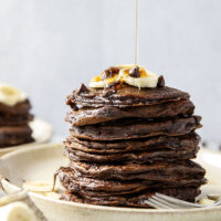 These thick and fluffy chocolate banana pancakes are the ultimate breakfast indulgence! Loaded with a double whammy of chocolate and lots of banana flavor.