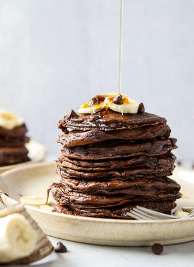 These thick and fluffy chocolate banana pancakes are the ultimate breakfast indulgence! Loaded with a double whammy of chocolate and lots of banana flavor.