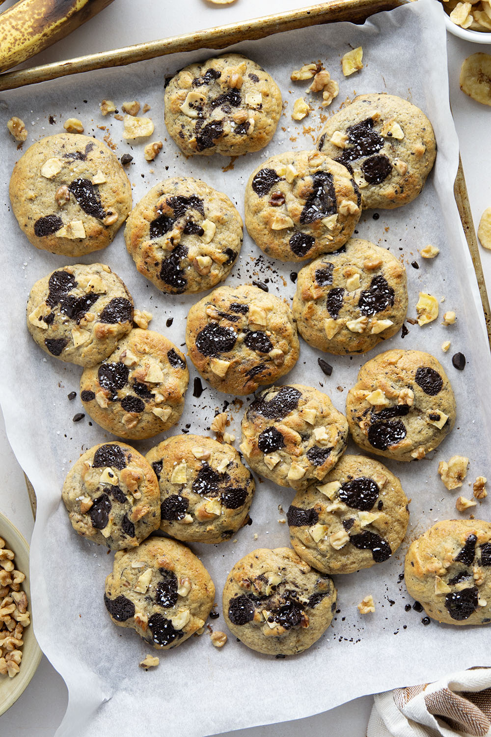 Jam-packed with toasted walnuts, banana, and gooey chocolate chunks, these chunky monkey cookies are a riff on the classic Ben & Jerry's ice cream and are sure to become a cookie jar staple!