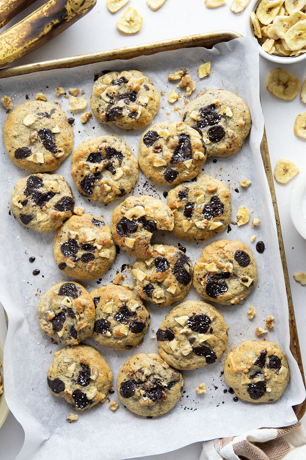 Jam-packed with toasted walnuts, banana, and gooey chocolate chunks, these chunky monkey cookies are a riff on the classic Ben & Jerry's ice cream and are sure to become a cookie jar staple!