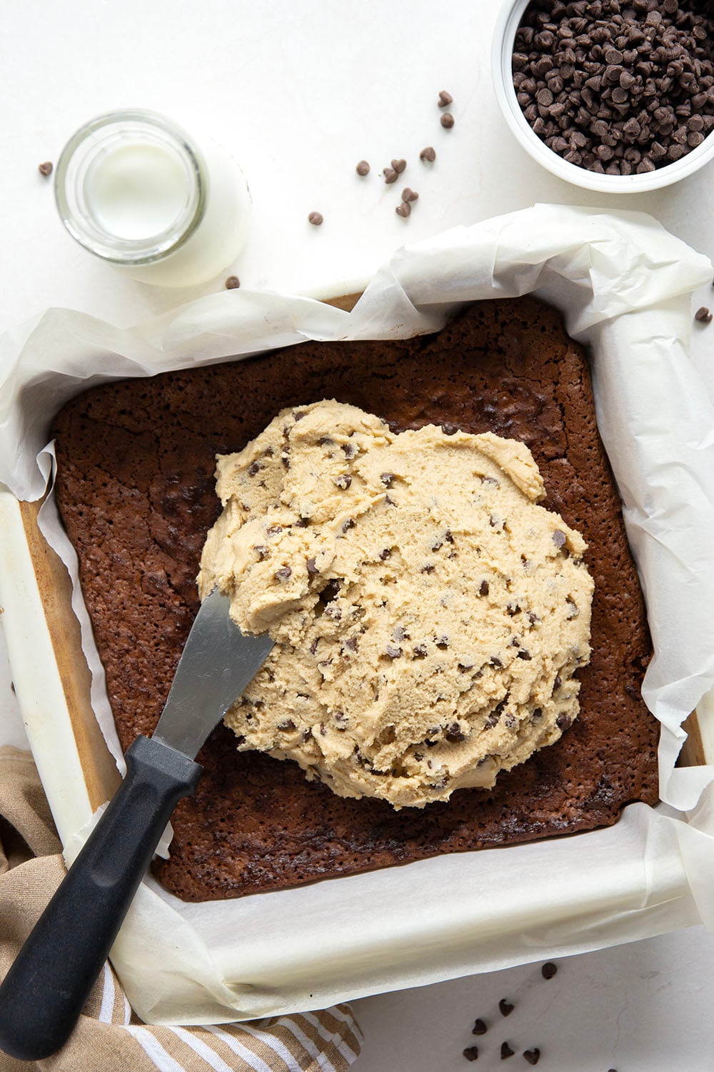 Layers of fudgy brownie and rich cookie dough collide in these ultimate cookie dough brownies!