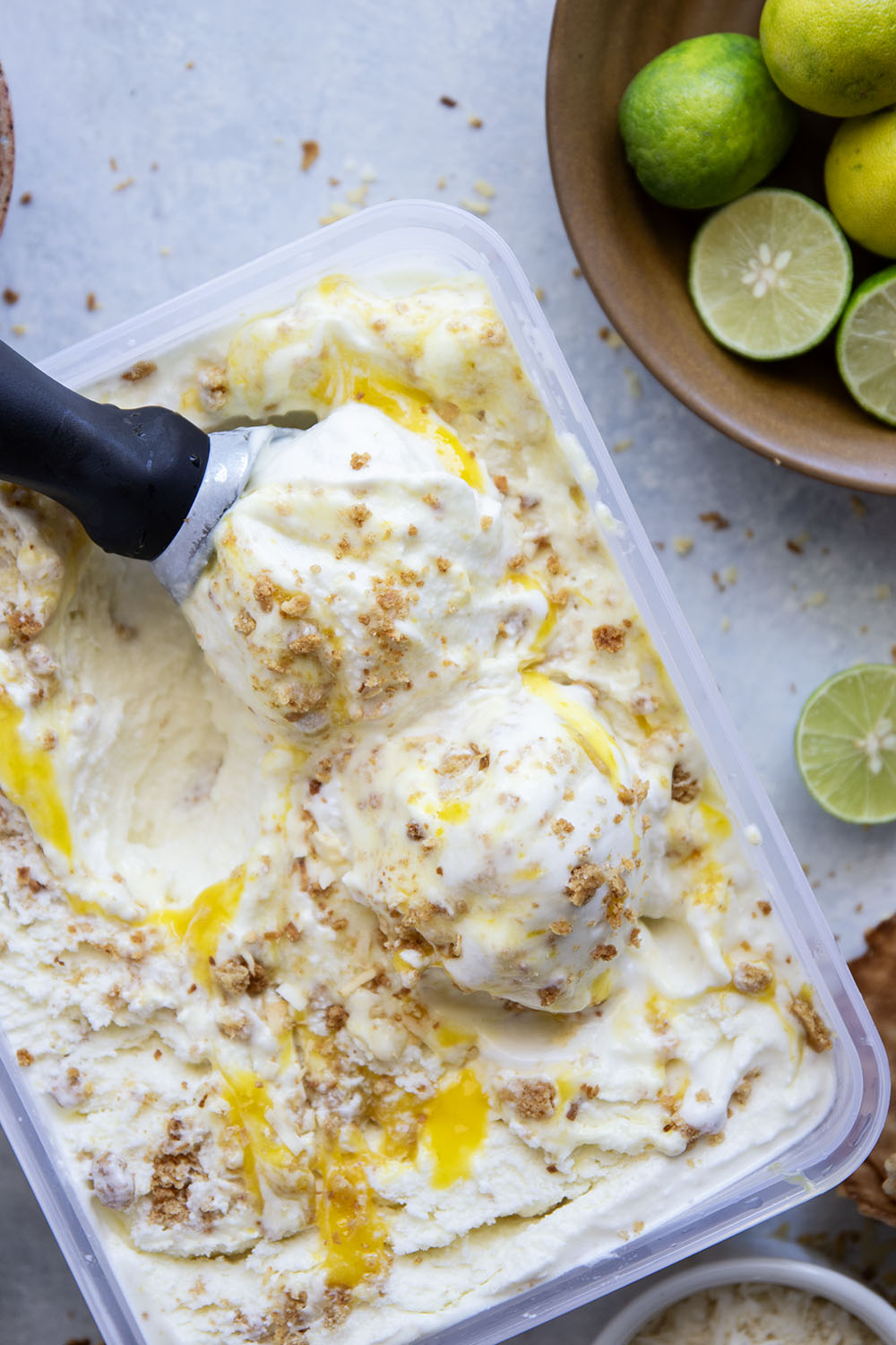 This key lime pie ice cream features homemade key lime curd, graham cracker cookie bits, and coconut milk for the ultimate scoop of creamy tropical heaven.