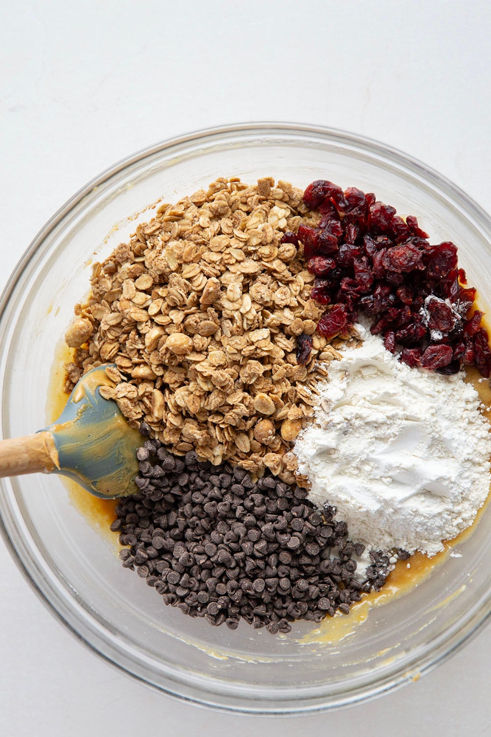 Loaded to the max with lots of creamy peanut butter, crunchy granola, and melty chocolate chips, these grab-and-go peanut butter breakfast cookies are lower in fat and the best way to start the day!