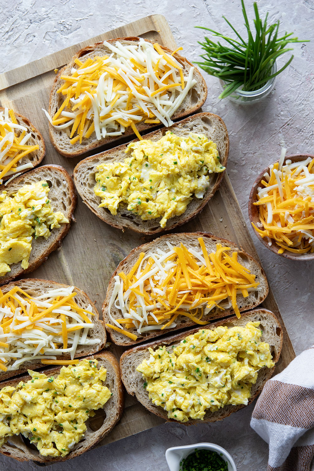This breakfast-style scrambled egg grilled cheese is loaded to the max with scrambled eggs and two kinds of gooey cheese.