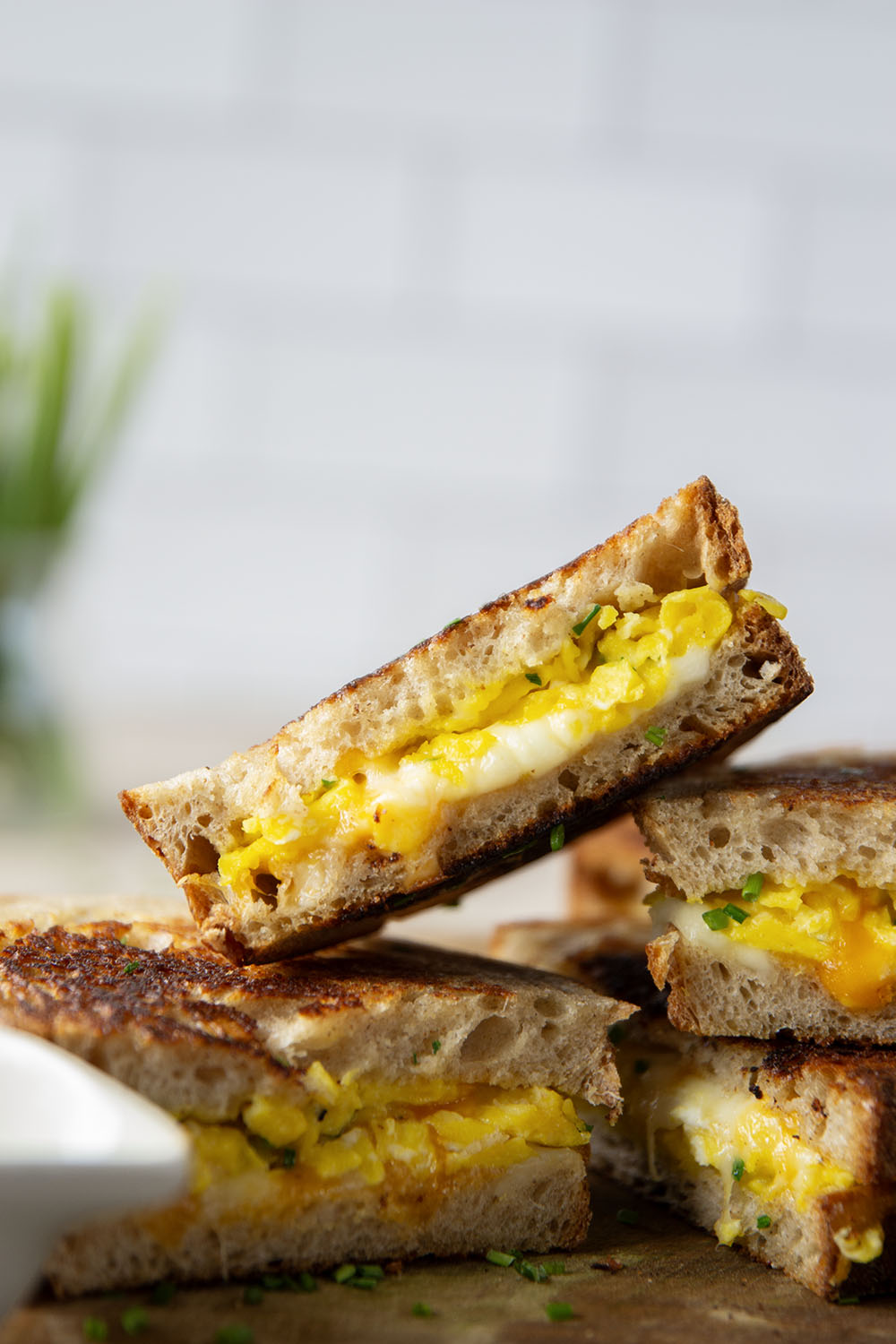 This breakfast-style scrambled egg grilled cheese is loaded to the max with scrambled eggs and two kinds of gooey cheese.