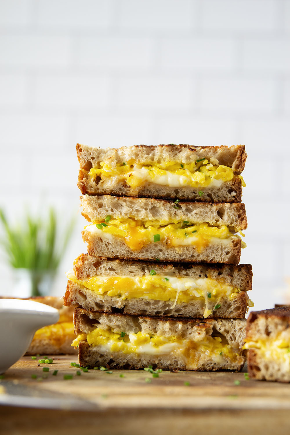 This breakfast-style scrambled egg grilled cheese is loaded to the max with scrambled eggs and two kinds of gooey cheese.