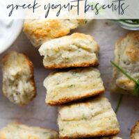 Fresh herbs and tangy Greek yogurt are a match made in heaven in these flaky Greek yogurt biscuits! Crack them open warm from the oven and top with lots of butter.