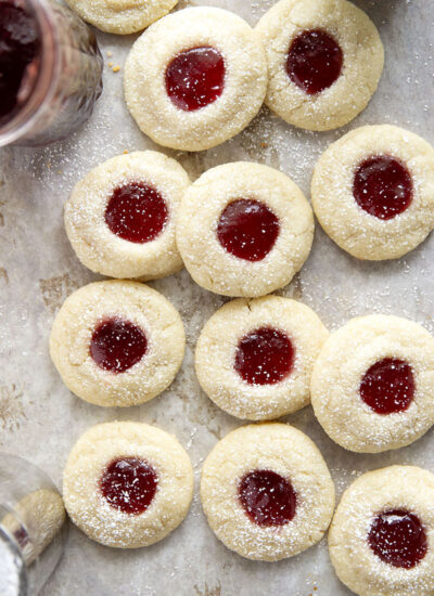 These beautiful jam shortbread cookies are crisp, buttery and filled with lots of sweet jam! They're always well-received at any kind of gathering.