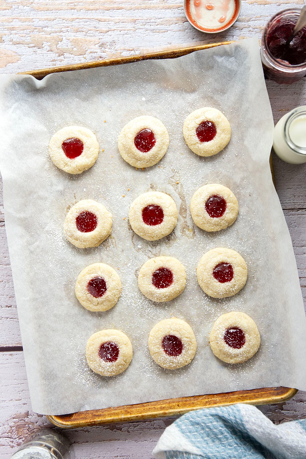 These beautiful jam shortbread cookies are crisp, buttery and filled with lots of sweet jam! They're always well-received at any kind of gathering.