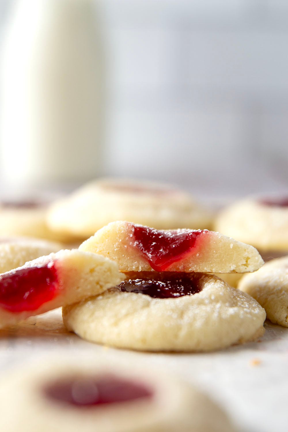 These beautiful jam shortbread cookies are crisp, buttery and filled with lots of sweet jam! They're always well-received at any kind of gathering.