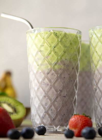 A double layer of mixed berries and vibrant green ingredients comes together in this protein-packed berry green smoothie that you can feel good about sipping!