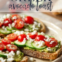 This Greek avocado toast is quick and easy enough for any kind of breakfast occasion! Pile toasted bread slices with silky mashed avocado, crisp cucumber slices, lots of fresh cherry tomatoes, and feta.