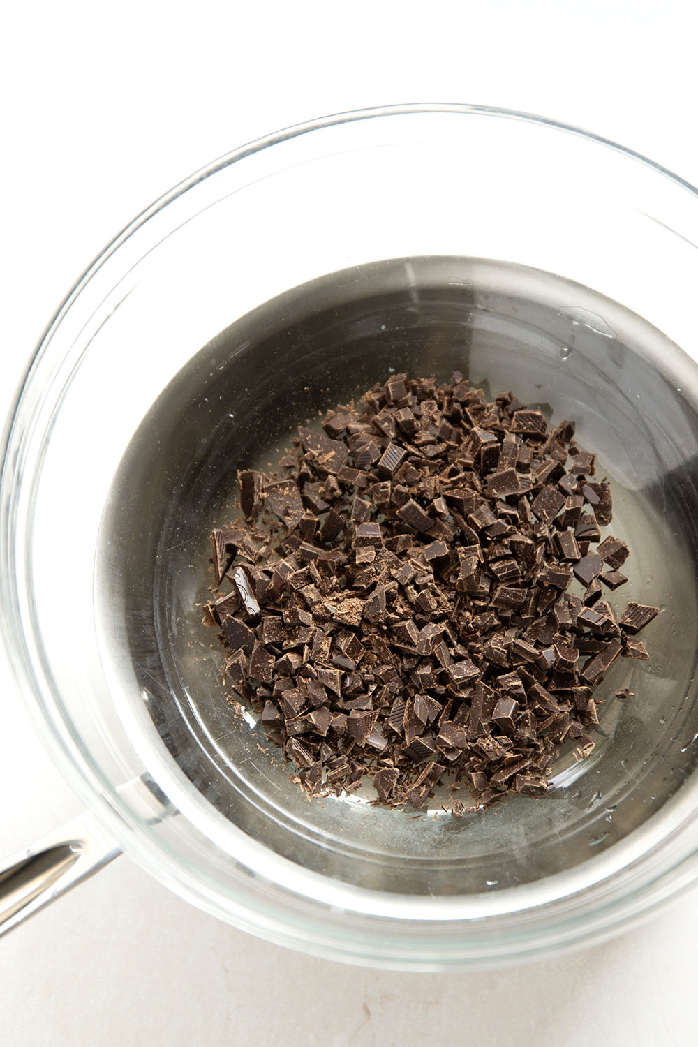 Learn how to melt chocolate perfectly every time with this easy tutorial that utilizes either a double-boiler or the microwave.