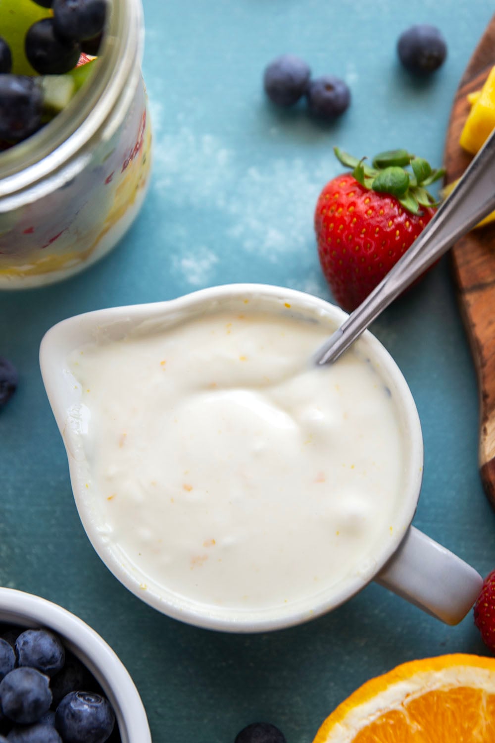 Take your fruit salad along to those summer picnics the easy way! Layer it up rainbow-style in a jar with a creamy citrus yogurt dressing. This layered fruit salad will quickly become a summer favorite.