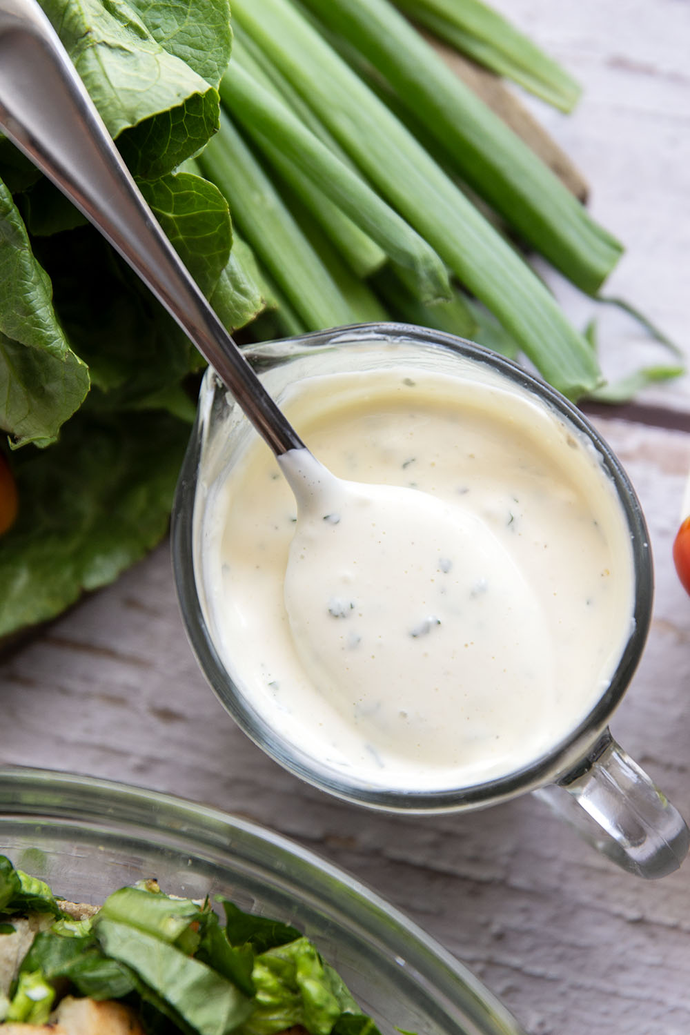 Smoky grilled chicken thighs, silky avocado cubes, cherry tomatoes, and a homemade buttermilk ranch dressing take this ranch chicken chopped salad to another level!