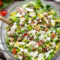 Smoky grilled chicken thighs, silky avocado cubes, cherry tomatoes, and a homemade buttermilk ranch dressing take this ranch chicken chopped salad to another level!