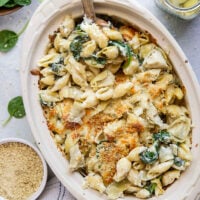 This spinach artichoke mac and cheese combines all the things you love about spinach artichoke dip in one comforting side dish! Packed with two kinds of cheese and lots of tender spinach and artichoke hearts.