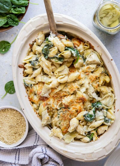 This spinach artichoke mac and cheese combines all the things you love about spinach artichoke dip in one comforting side dish! Packed with two kinds of cheese and lots of tender spinach and artichoke hearts.