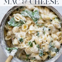 This spinach artichoke mac and cheese combines all the things you love about spinach artichoke dip in one comforting side dish! Packed with two kinds of cheese and lots of tender spinach and artichoke hearts.
