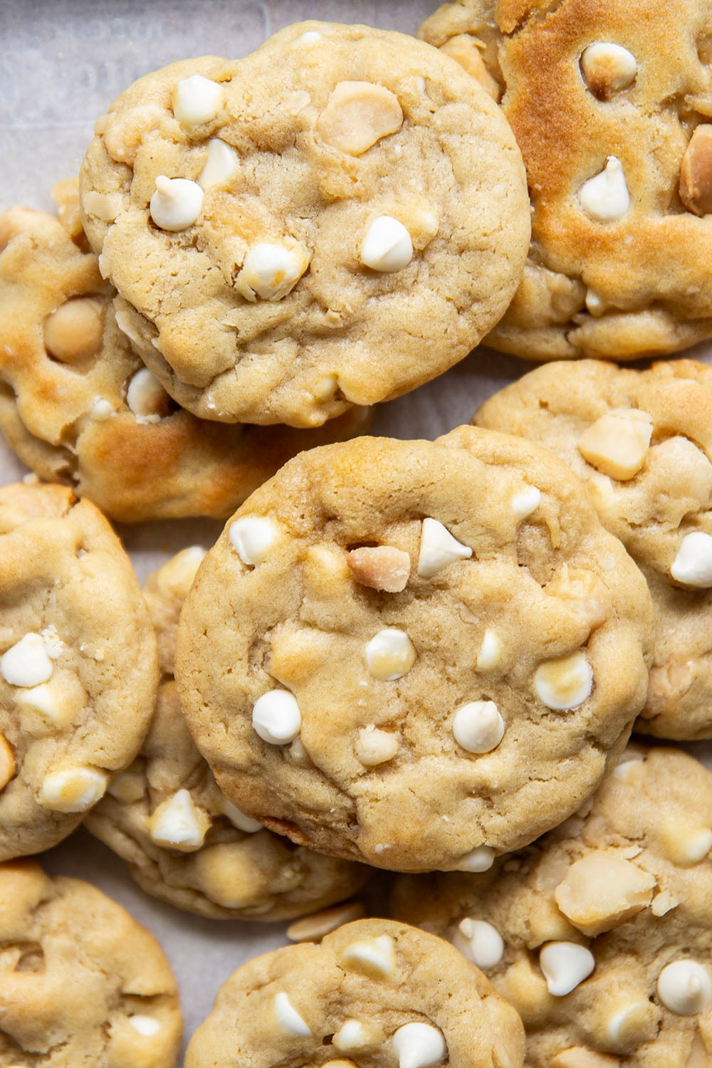 Supremely thick, chewy, and loaded with the classic combo of rich white chocolate and buttery macadamia nuts, these white chocolate macadamia nut cookies are a cookie jar keeper!