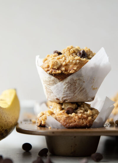 These banana chocolate chip muffins feature the texture you love about banana bread in muffin form along with lots of gooey chocolate and a to-die-for buttery streusel on top.