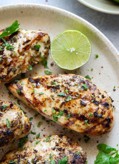 Marinated for hours in a flavorful fresh lime and cilantro marinade and then thrown on the grill, this grilled cilantro lime chicken is impossibly juicy and will quickly become a grill staple!