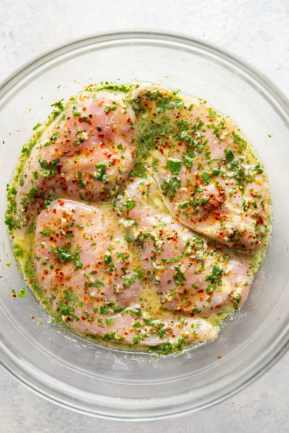 Marinated for hours in a flavorful fresh lime and cilantro marinade and then thrown on the grill, this grilled cilantro lime chicken is impossibly juicy and will quickly become a grill staple!