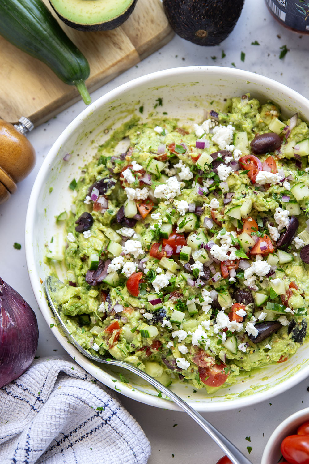Packed with fresh Greek-inspired ingredients and ready in minutes, this Greek guacamole is unbelievably fresh-tasting and goes great with pita chips for dipping.