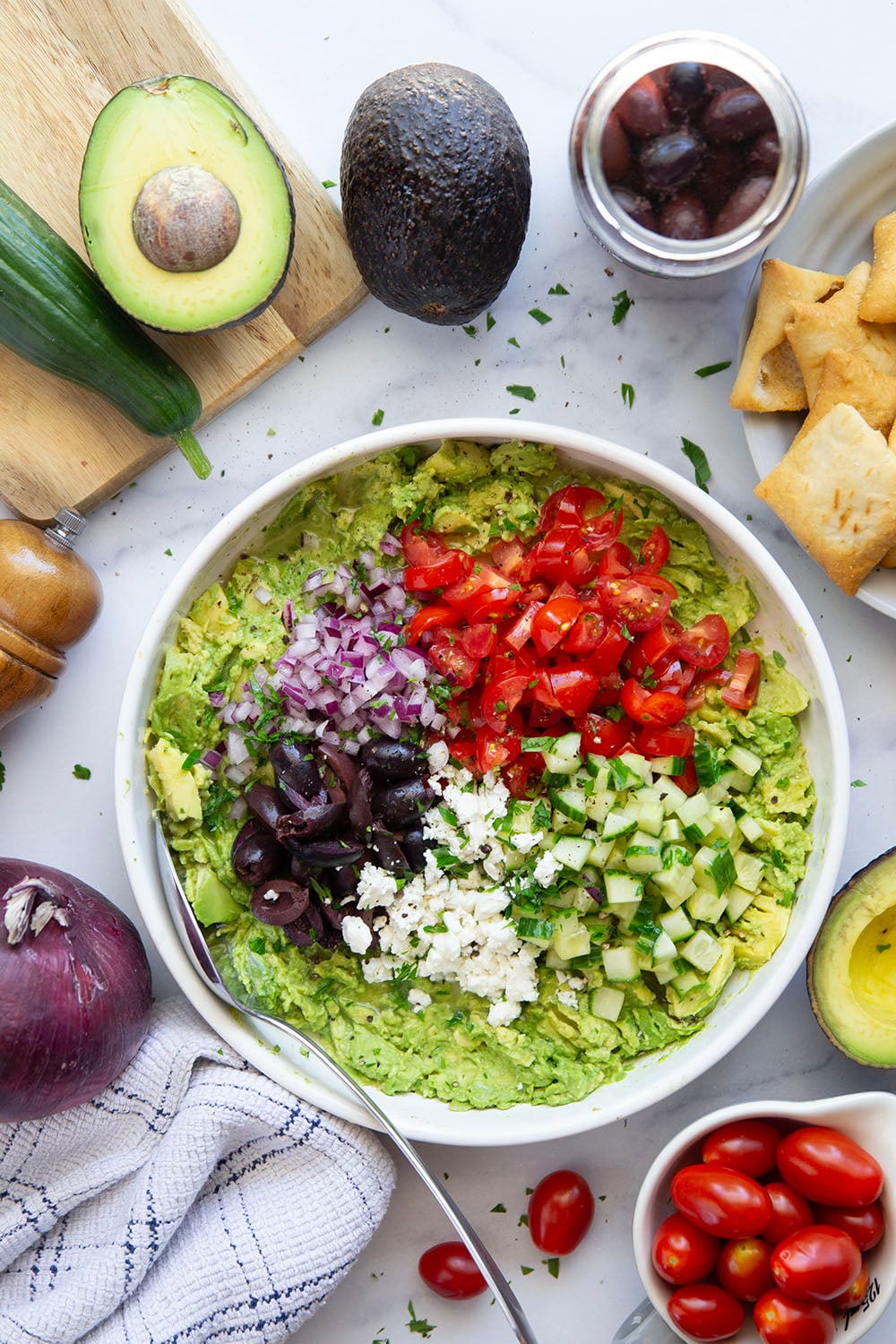 Packed with fresh Greek-inspired ingredients and ready in minutes, this Greek guacamole is unbelievably fresh-tasting and goes great with pita chips for dipping.