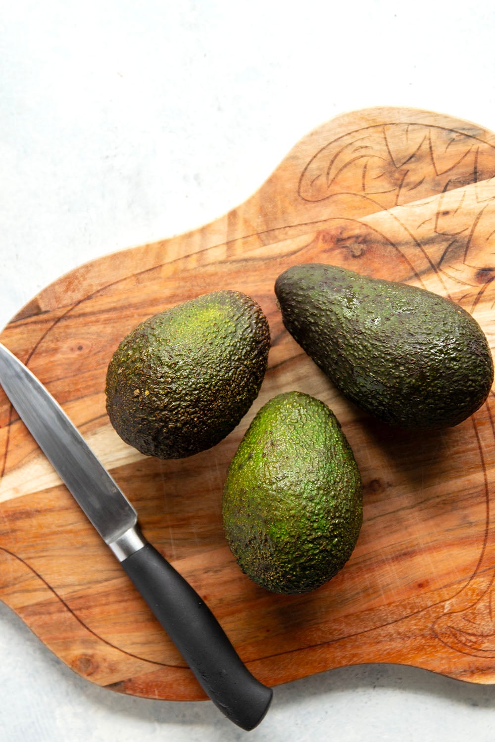 Learn how to cut an avocado easily and quickly every time with this simple step-by-step photo tutorial!