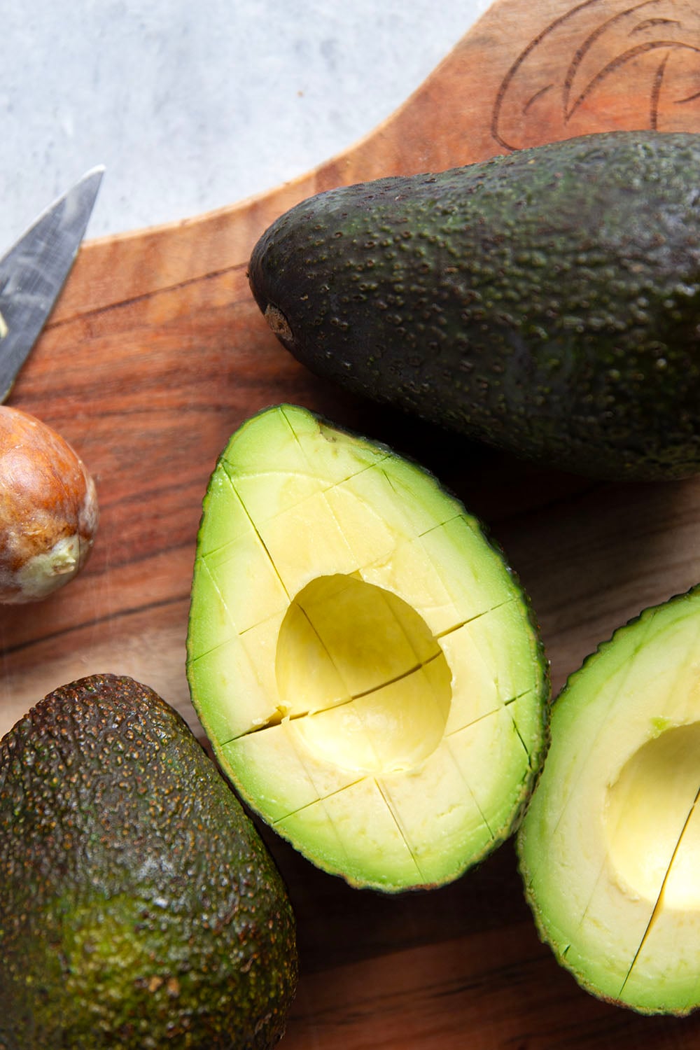 Learn how to cut an avocado easily and quickly every time with this simple step-by-step photo tutorial!