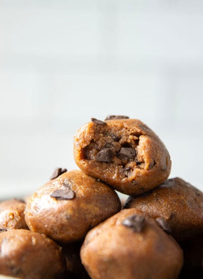 These almond butter cookie dough bites taste exactly like real cookie dough and feature a base of creamy almond butter and lots of chocolate chunks. Completely no-bake and lower in sugar!