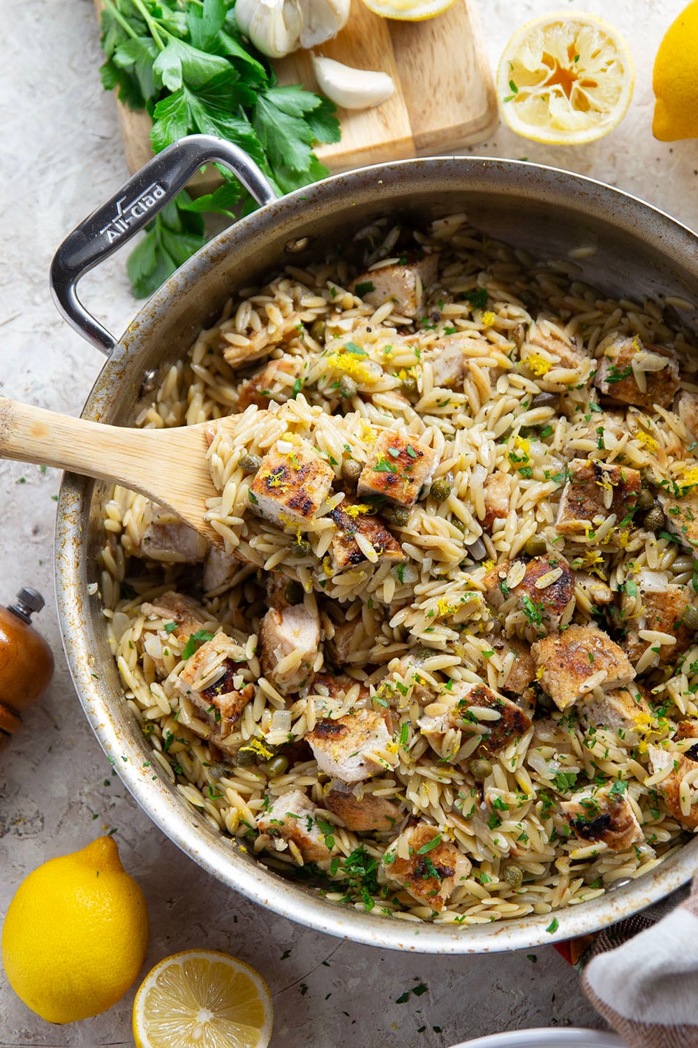 If you love classic restaurant chicken piccata, you'll love this easy one-pot chicken piccata orzo that features lots of fresh lemon, flavorful white wine, and tangy capers in a fluffy orzo base.