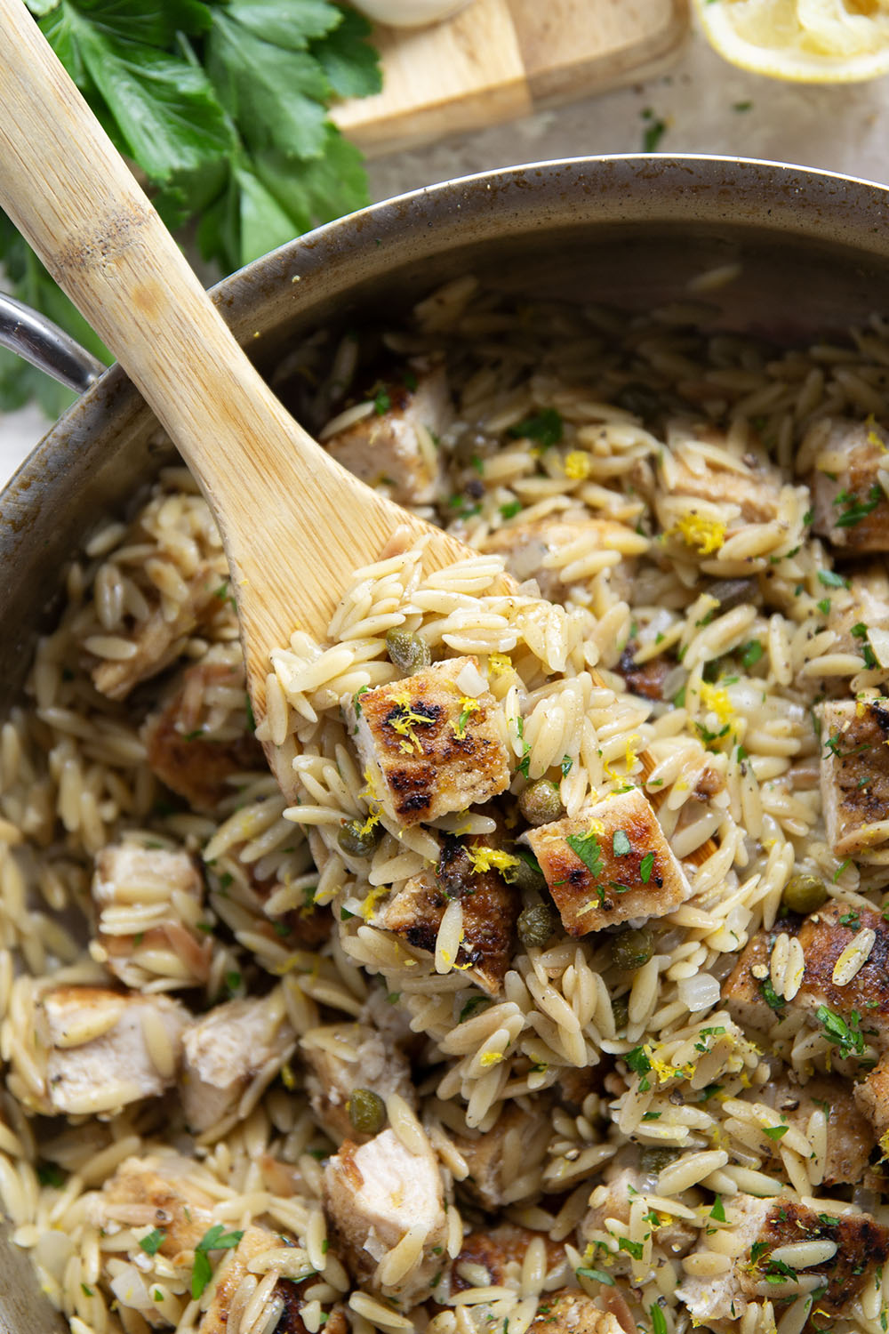 If you love classic restaurant chicken piccata, you'll love this easy one-pot chicken piccata orzo that features lots of fresh lemon, flavorful white wine, and tangy capers in a fluffy orzo base.