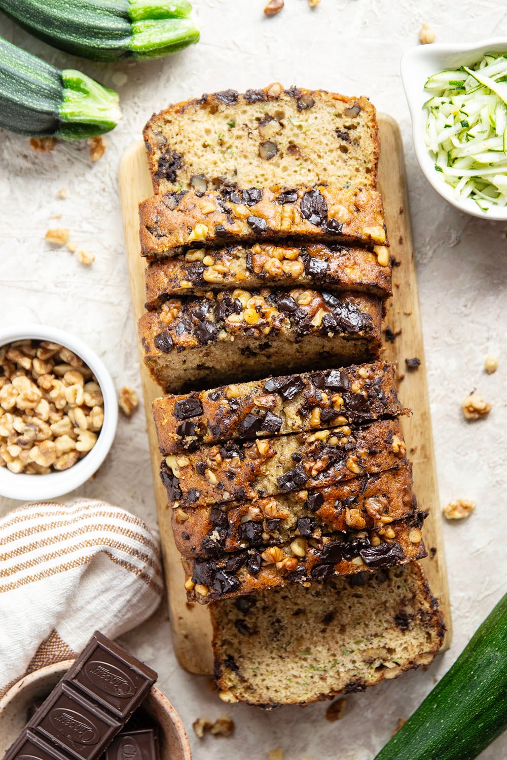 This dark chocolate zucchini bread is so moist and exploding with gooey dark chocolate chunks, you won't believe it's on the healthier side!