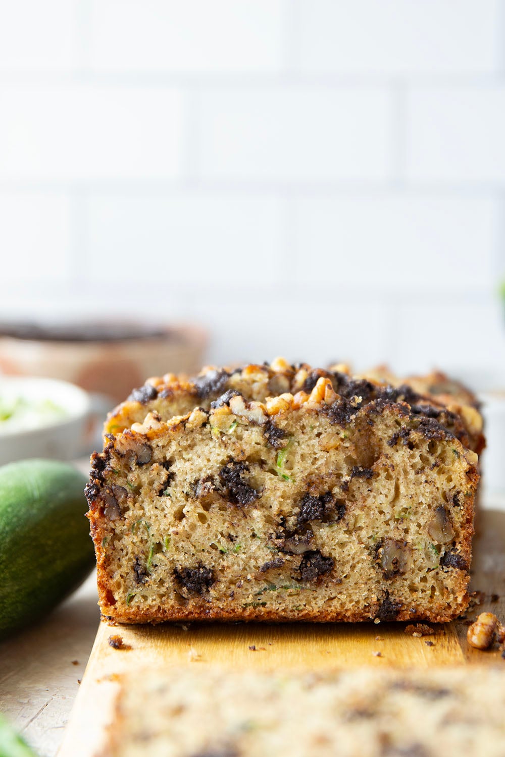 This dark chocolate zucchini bread is so moist and exploding with gooey dark chocolate chunks, you won't believe it's on the healthier side!