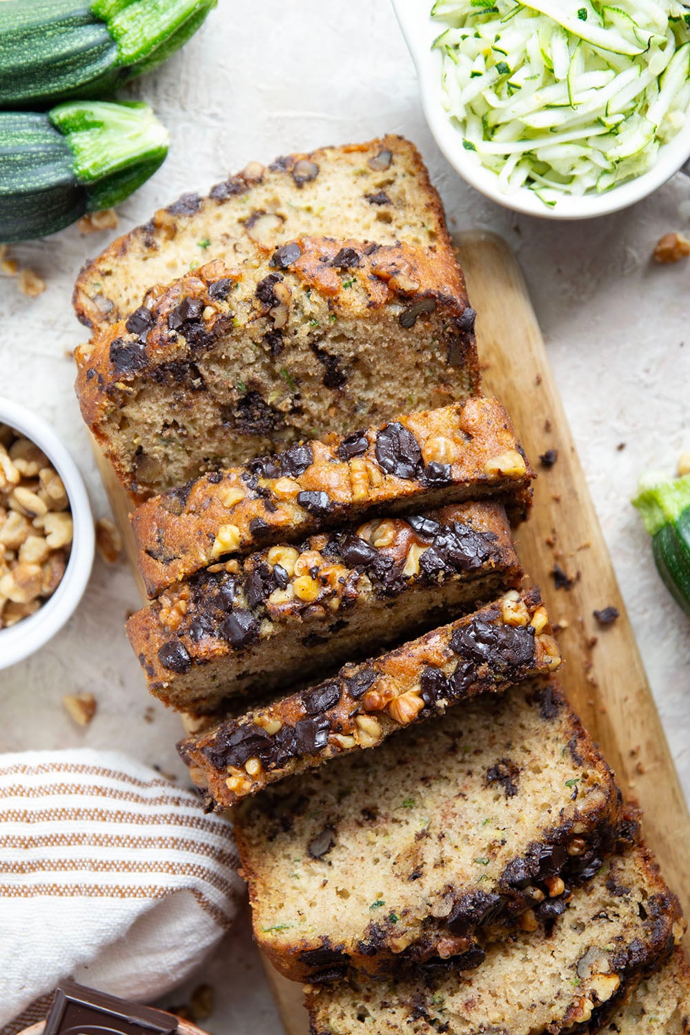 This dark chocolate zucchini bread is so moist and exploding with gooey dark chocolate chunks, you won't believe it's on the healthier side!