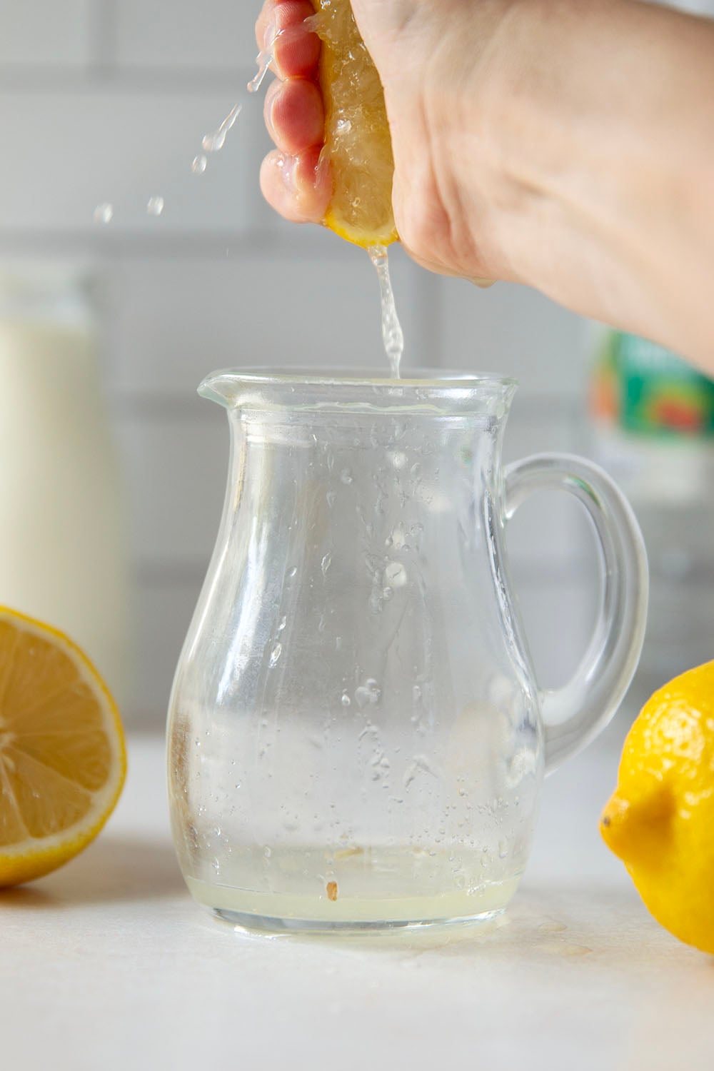 Out of buttermilk? No need to run to the store when you can easily make your own with only two ingredients in less than ten minutes!