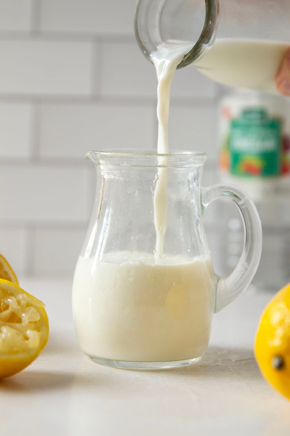 Out of buttermilk? No need to run to the store when you can easily make your own with only two ingredients in less than ten minutes!