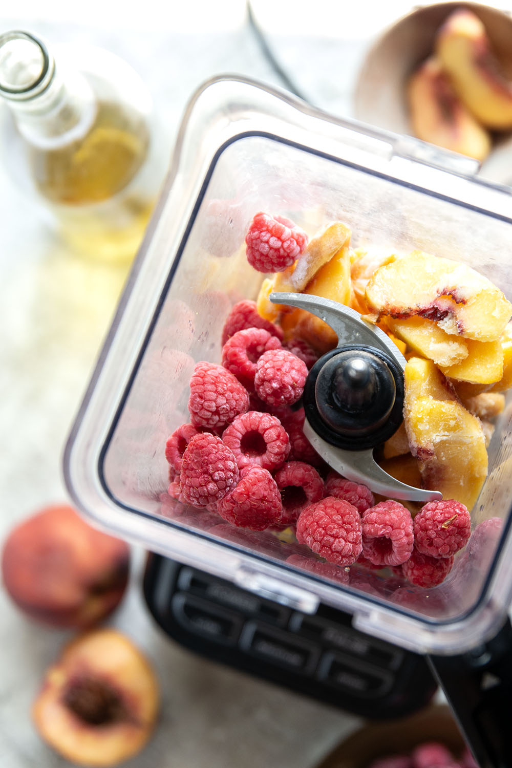 These peach raspberry wine slushies are exploding with sweet summer peaches and raspberries. They blend up in minutes and you can easily double the recipe for a crowd.