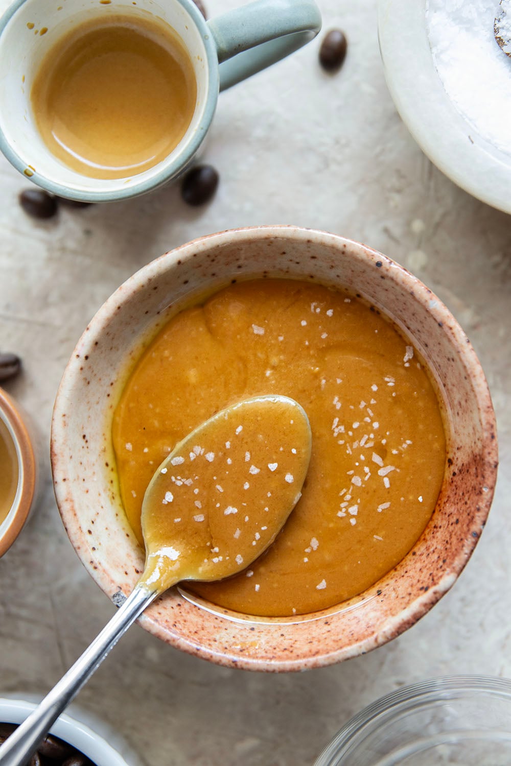 Drizzles of homemade salted caramel sauce, rich espresso, and creamy vanilla ice cream come together in this salted caramel affogato.
