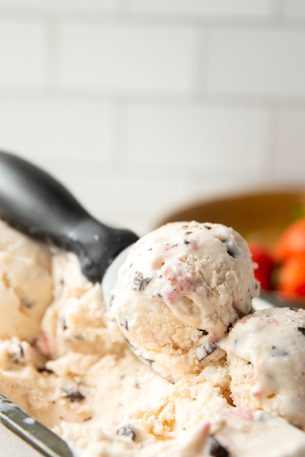 Churned with a fresh strawberry sauce and lots of chocolate chip pieces, this strawberry chocolate chip ice cream is dreamy with fresh summer strawberries!