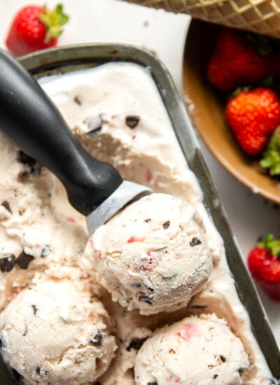 Churned with a fresh strawberry sauce and lots of chocolate chip pieces, this strawberry chocolate chip ice cream is dreamy with fresh summer strawberries!